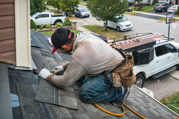 Professional Roofing technician working in Akron, NY